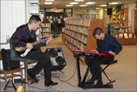 Guitarist Abe Ovadia and organist Anthony Pacetti play a soulful John Coltrane ballad Friday night at “Jazz in the Stacks” at the La Plata library.