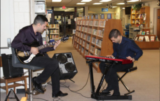 Guitarist Abe Ovadia and organist Anthony Pacetti play a soulful John Coltrane ballad Friday night at “Jazz in the Stacks” at the La Plata library.