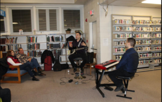 Abe Ovadia explains a bit about the composition of jazz music Friday night at “Jazz in the Stacks” at the La Plata branch of the Charles County Public Library.