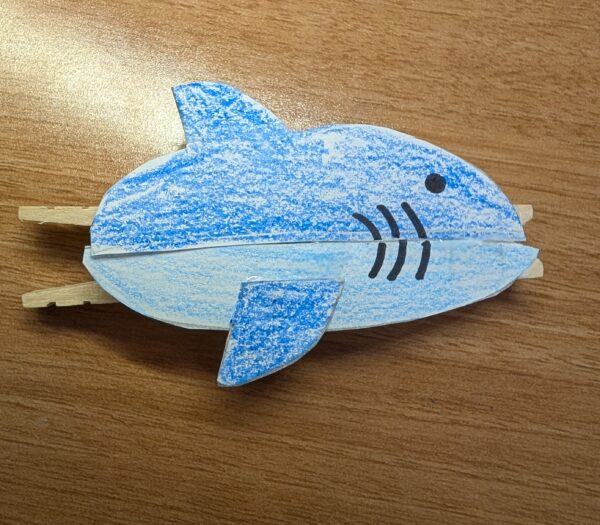Step 4: Glue the shark to the clothespin.
