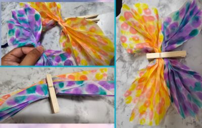 Step Five: Step Five: Take your laundry clip and clip on both of the coffee filters. Open the flaps of the filters to create “wings”.