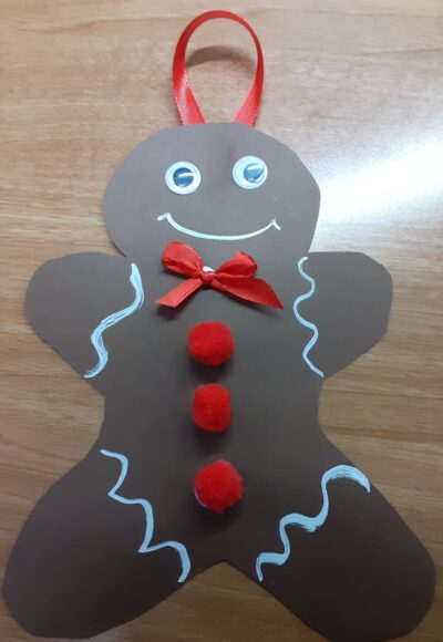 Glue on the eyes and the pom pom buttons